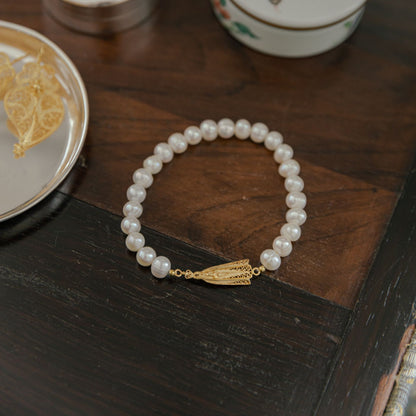 Pulseira Nossa Senhora de Fátima em Prata Dourada com Pérolas