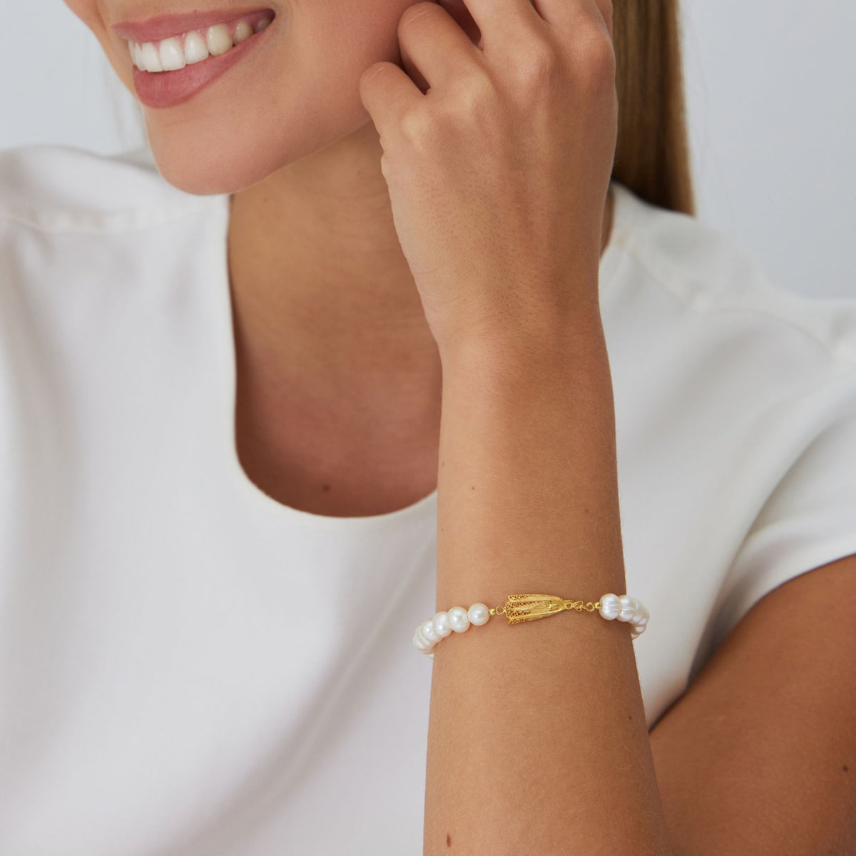 Pulseira Nossa Senhora de Fátima em Prata Dourada com Pérolas
