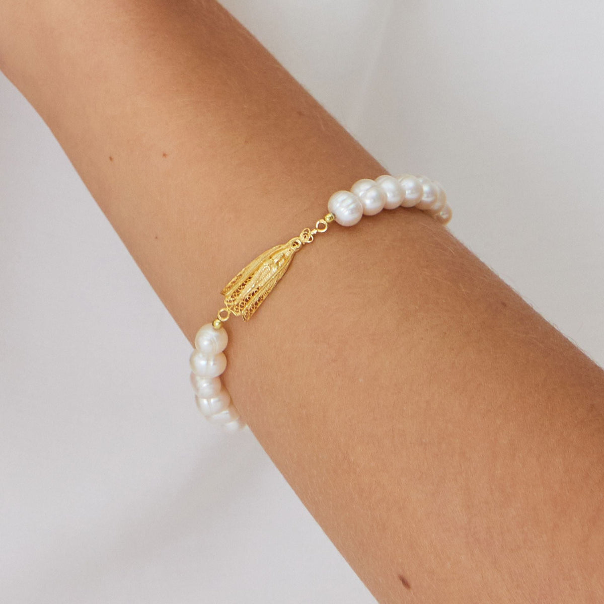 Conjunto Nossa Senhora de Fátima em Prata Dourada